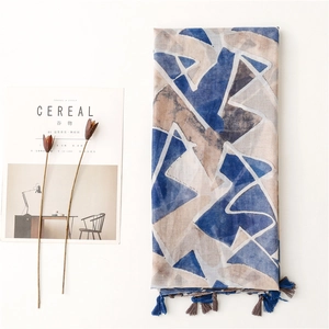 Ethnic style geometric print scarf with tassels and artistic blue block patterns