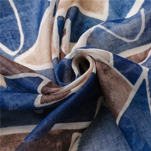 Ethnic style cotton linen scarf with blue and brown geometric print and tassels