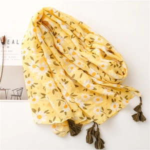 Yellow linen scarf with white daisy print and dark green tassels for spring and summer