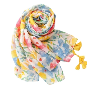 Floral print cotton linen scarf with tropical flowers and bright yellow tassels