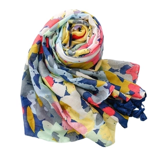 Artistic tropical floral beach shawl with colorful graffiti print and tassel edges