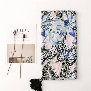 Tropical floral print cotton linen scarf with tassels and butterfly motifs on pink base