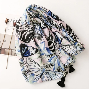 Pink tropical butterfly print scarf with black tassels made of linen cotton blend fabric