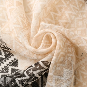 Elegant bohemian cotton linen scarf with black geometric wave pattern and fringed edges