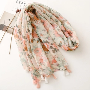 Floral cotton linen feel scarf with large pink peony prints and delicate fringe tassels