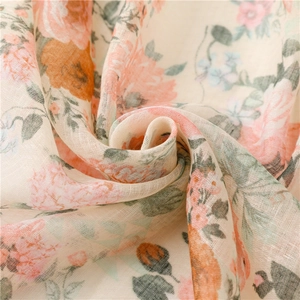 Elegant beige cotton-linen scarf with vintage floral print and fringe details