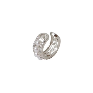 Detail of silver C-shape ear cuff featuring white pearls and pavé cubic zirconia accents