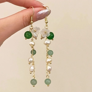 Elegant gold earrings with green jade beads, freshwater pearls and tassel floral pendants
