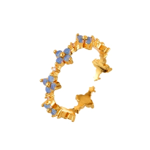 Elegant gold flower ring with blue zircon stones and adjustable open band for women