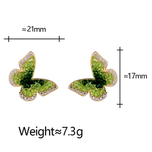 Detailed view of green crystal butterfly studs with measurements 21mm by 17mm and 7.3g weight