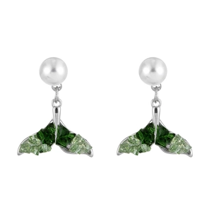 Detailed close-up of fish tail drop earrings with green crystals and white pearls