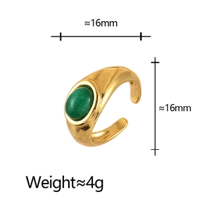 Detail view of vintage gold ring with green cat eye stone showing 16mm size and 4g weight