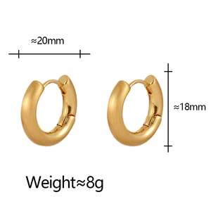Detail of gold brushed metal hoop earrings showing dimensions of 20mm outer diameter