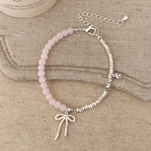 Pink quartz bead and silver geometric chain bracelet with hollow bow charm