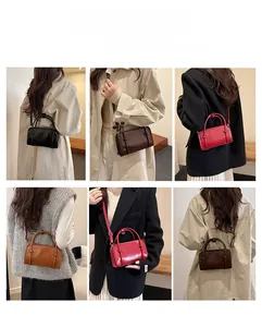 Detail view of leather shoulder bag in four colors with knotted handles and multiple carrying options