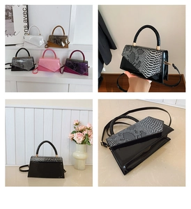 Detail view of small square bags showing snake pattern leather texture and top handle design