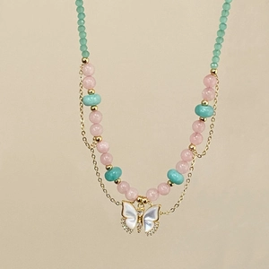 Sweet macaron beaded necklace with a white shell butterfly pendant and gold chain
