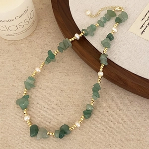 Handmade necklace with natural green stone chips, freshwater pearls and gold beads