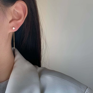 Minimalist long chain drop earrings with white bead and gold tassel for daily wear
