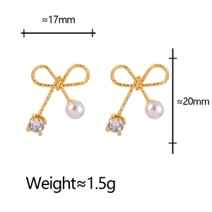 Detail view of bow earrings with pearl and zircon showing 17mm width and 20mm height