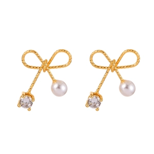 Elegant gold bow earrings with white pearls and sparkling cubic zirconia stones