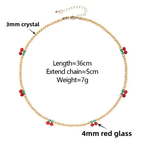 Détail du collier de perles de cristal jaune 3mm avec cerises en verre 4mm et fermoir métal