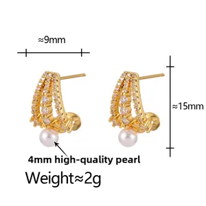 Detail showing gold C-shaped earrings with micro-pave crystals and 4mm white pearl