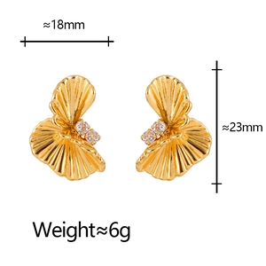 Detailed view of golden twisted fan-shaped earrings with zircon inlay and measurements