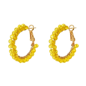 Elegant gold hoop earrings with yellow faceted crystal beads and wire wrapping