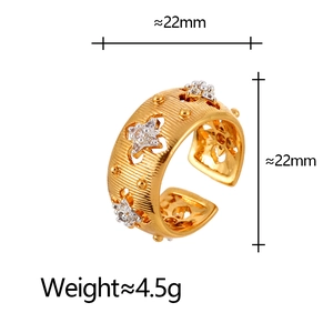 Detail showing wide brushed gold star ring with zircons and 22mm dimension markings