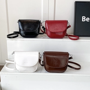 Minimalist glossy saddle crossbody bags in black, red, white and dark brown colors
