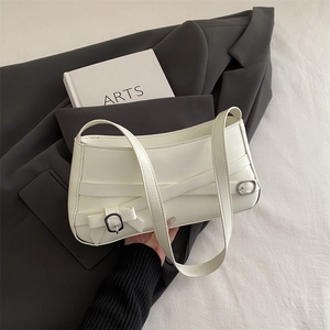 Retro white PU leather underarm bag with decorative belt buckles and bow details