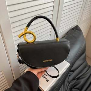 Chic black saddle bag with a unique gold knot handle and FASHION & BAGS lettering