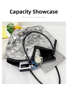 Capacity display of silver sequin tote bag showing iPad, notebook, and folding umbrella