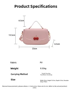 Detailed size chart for pink shoulder bag with cherry detail and adjustable strap