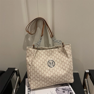 Retro beige oversized tote bag with brown M monogram pattern and leather chain strap