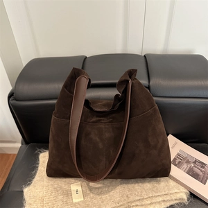 Brown suede tote bag with minimalist design for fall fashion and daily commute