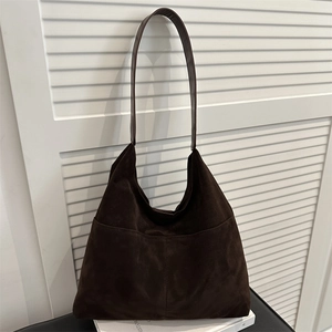 Deep brown matte suede hobo tote bag for women shown against white background