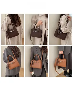 Detail view of large matte tote bags in dark coffee and caramel with stylish metal turn-locks