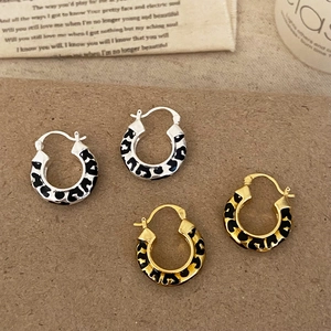 Minimalist leopard print hoop earrings in gold and silver finish with enamel drip