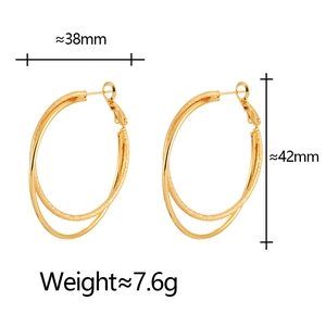 Golden double hoop earrings with interlocking matte and polished rings, size 38mm x 42mm