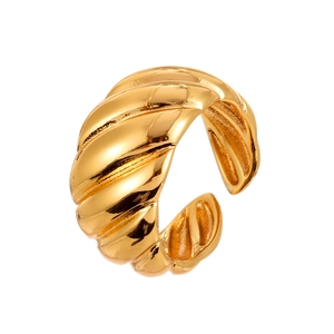 Minimalist gold croissant dome ring with twisted spiral texture and adjustable band