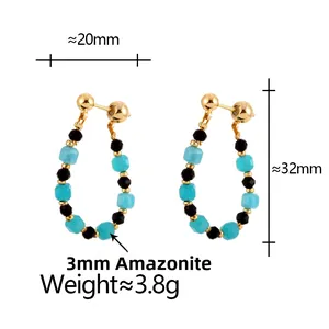 Detailed view of beaded teardrop earrings with black crystals and amazonite beads