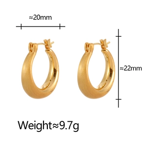 Minimalist gold brushed metal hoop earrings with elegant matte finish and clasp closure