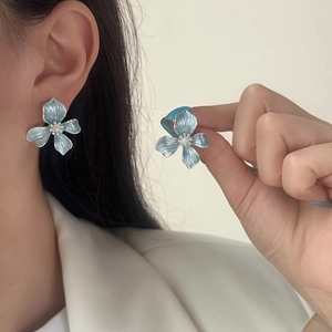 Elegant blue enamel flower stud earrings for women with high-quality textured finish