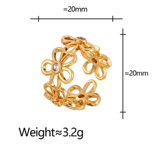 Detailed view of gold flower ring with zircons showing 20mm size and 3.2g weight