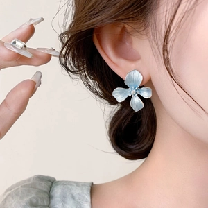 Elegant light blue four-petal flower stud earrings with white pearl center for women