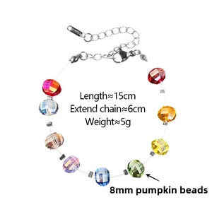 Detail of 8mm colorful pumpkin beads on stainless steel bracelet with extension chain