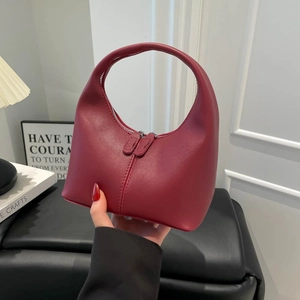Retro burgundy handbag with unique semi-circle handle and dual zipper design for women