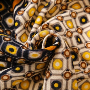 Detailed view of vintage geometric cotton linen scarf with mustard and navy print